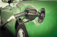 Refueling car with gas petrol green eco style Royalty Free Stock Photo