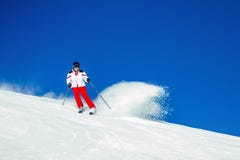 Expert Male Skier Carving Through Fresh Snow Royalty Free Stock Photography