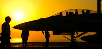 F-18 Super Hornet Sunset Launch Stock Photo