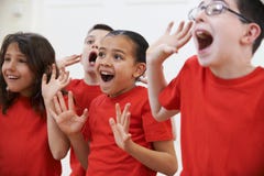 Group Of Children Enjoying Drama Class Together Stock Photography