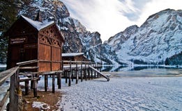 Small house on mountain lake Stock Photography
