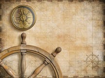 Steering wheel and compass with vintage nautical Royalty Free Stock Images